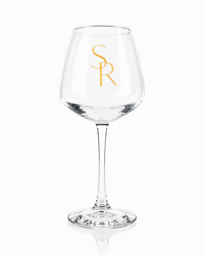A single SR-branded stemmed wine glass