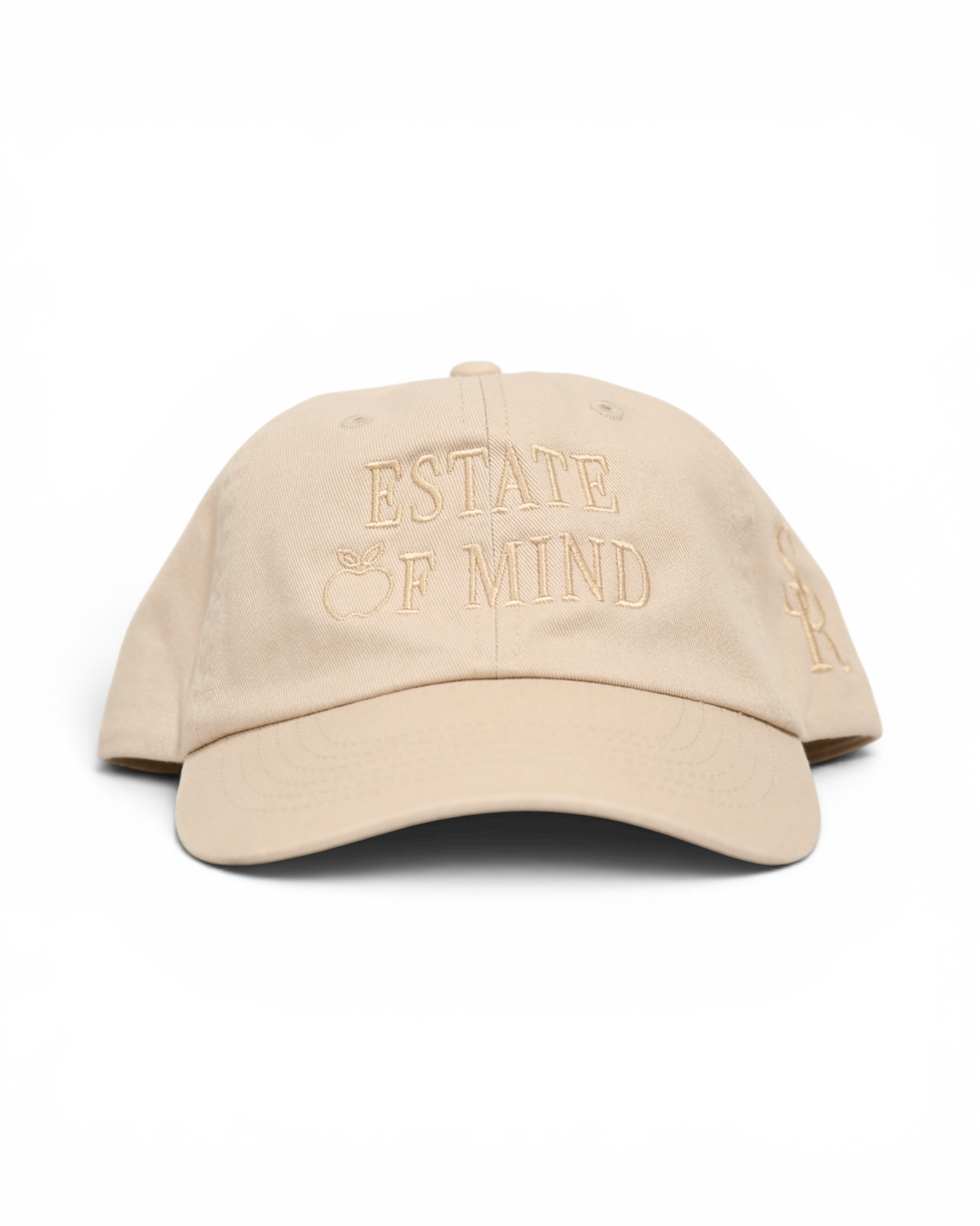 Cream cap with 'Estate of Mind' text on a white background