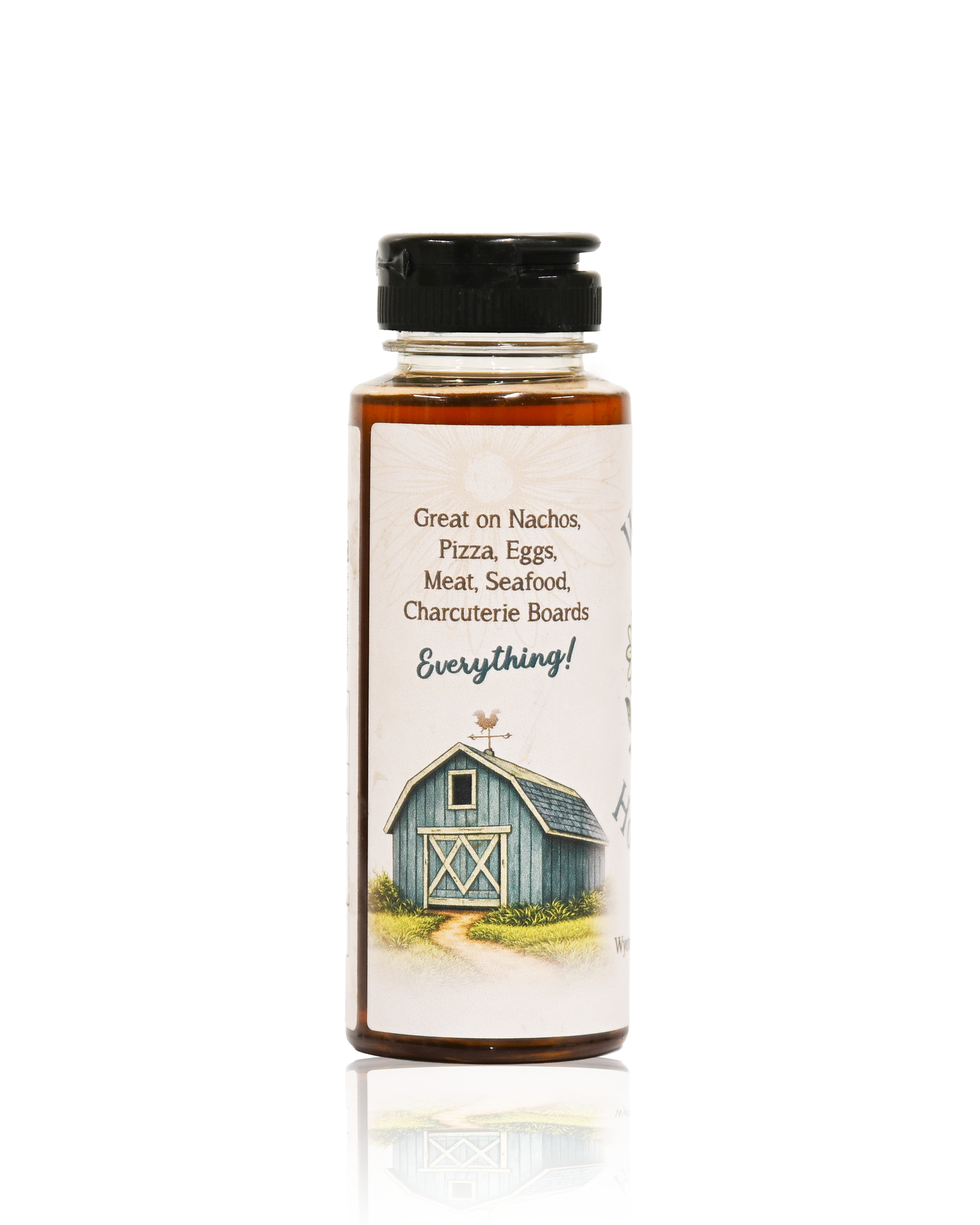 Bottle of Wesley's Hot Honey with a label on a white background
